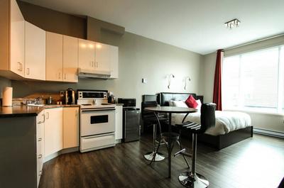 Chambre avec cuisinette   © Hôtel Le Saint-Germain