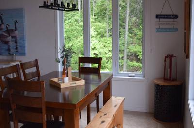 Salle à manger vue sur le fleuve