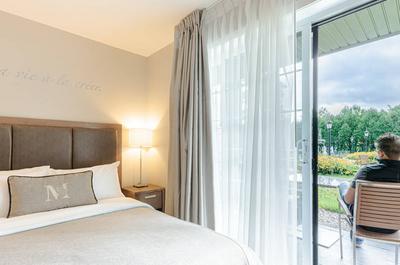 Chambre Oasis   © Hôtel Montfort Nicolet - Centre de congrès