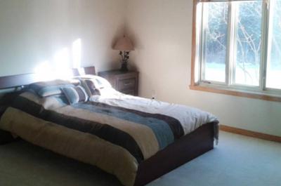 Chambre   © Auberge Domaine St-Amand
