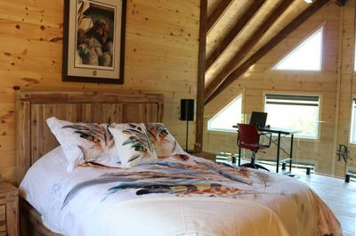 Chambre des maîtres sur mezzanine avec vue   © Chalets BSL