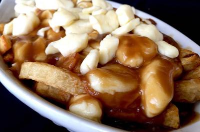 Poutine Sept-Îles   © Gino Pizza