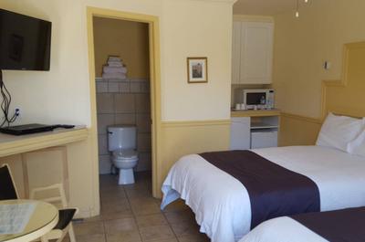 Chambre avec 2 lits doubles