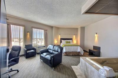 Chambre lit queen hotel du jardin