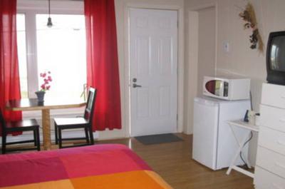 Chambre avec réfrigérateur et micro-onde   © Motel et Resto de la Mer